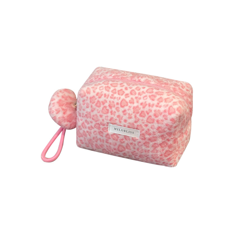 Nueva bolsa de maquillaje impresa de leopardo de peluche de pelo de conejo multifuncional portátil otoño y invierno para salir bolsa de almacenamiento de lavado de gran capacidad