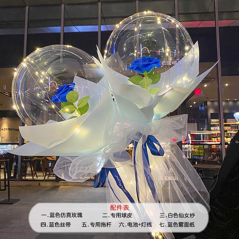 光る夜市の円形の赤い屋台のネットを並べてボールを押して会の風船のイルミネーションの明かりの告白のロマンチックな波の地帯のスーツを押します。|undefined