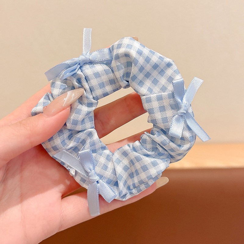 Blue hairgrip with bow