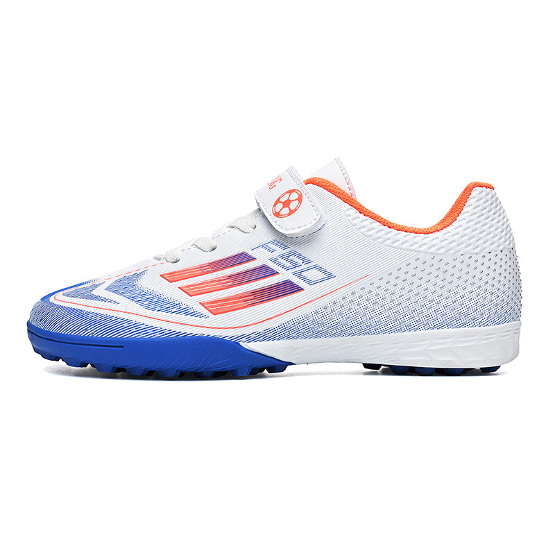 Nuevos niños transfronterizos niños y niñas transpirables cómodos deportes casuales zapatos de fútbol de clavos de césped estudiantes