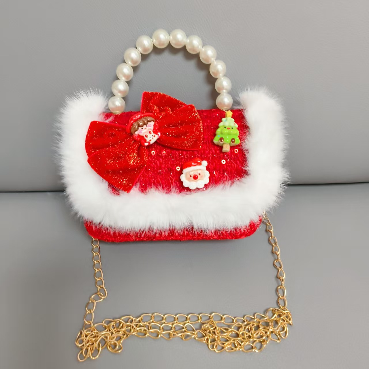 Cartera de Año Nuevo rojo arco de papá Noel bolso de perla pequeña cadena de viento fragante bolso de hombro