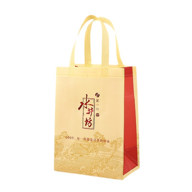 Bolsa de mano de película de espesamiento estampado en oro embalaje de vino no tejido bolsas de regalo UV color impresión de productos de salud bolsa de compras al por mayor