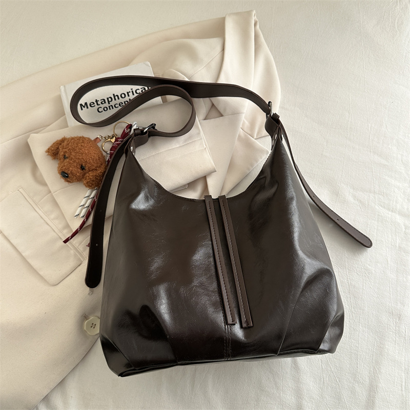 Alta sensación de viaje retro bolso de hombro de invierno 2024 nuevo bolso de mujer bolso de cuero suave brazo bolso de trabajo moda