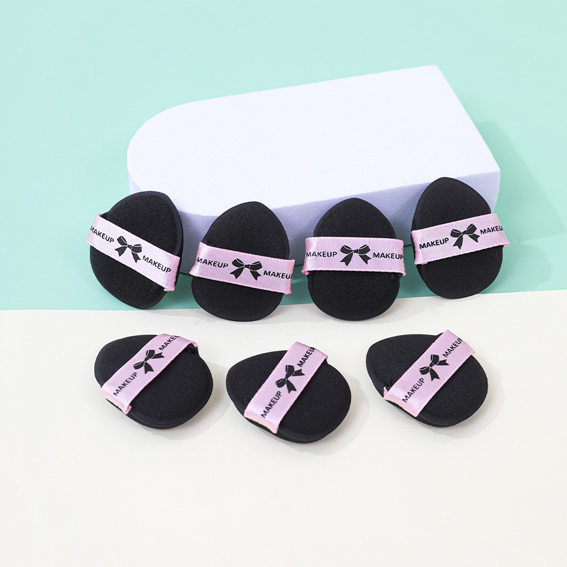 Sweet Cool series de polvo de cojín de aire de dedo para secar y húmedo de doble propósito mini puntera de pulgar para ocultar la pequeña esponja de base líquida para maquillaje