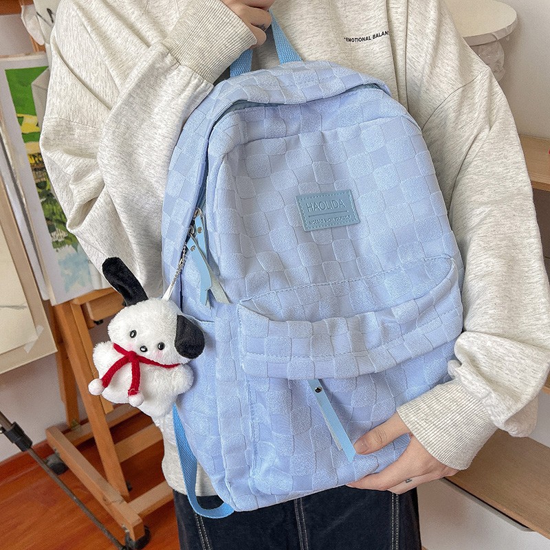 Estilo coreano ins estudiante nicho Plaid schoolbag Universidad simple todo partido color sólido de gran capacidad estudiante mochila casual