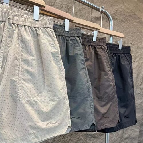Men's Trendy and Versatile 2024 Summer Sports Shorts with Breathable Mesh, Solid Color, Elastic Waist, and Five-Finger Beach Pants