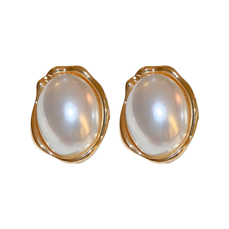 Aguja de plata pendientes de perlas ovales estilo francés Luz de lujo de alto grado pendientes nicho temperamento simple de cercanías pendientes del todo-fósforo para las mujeres