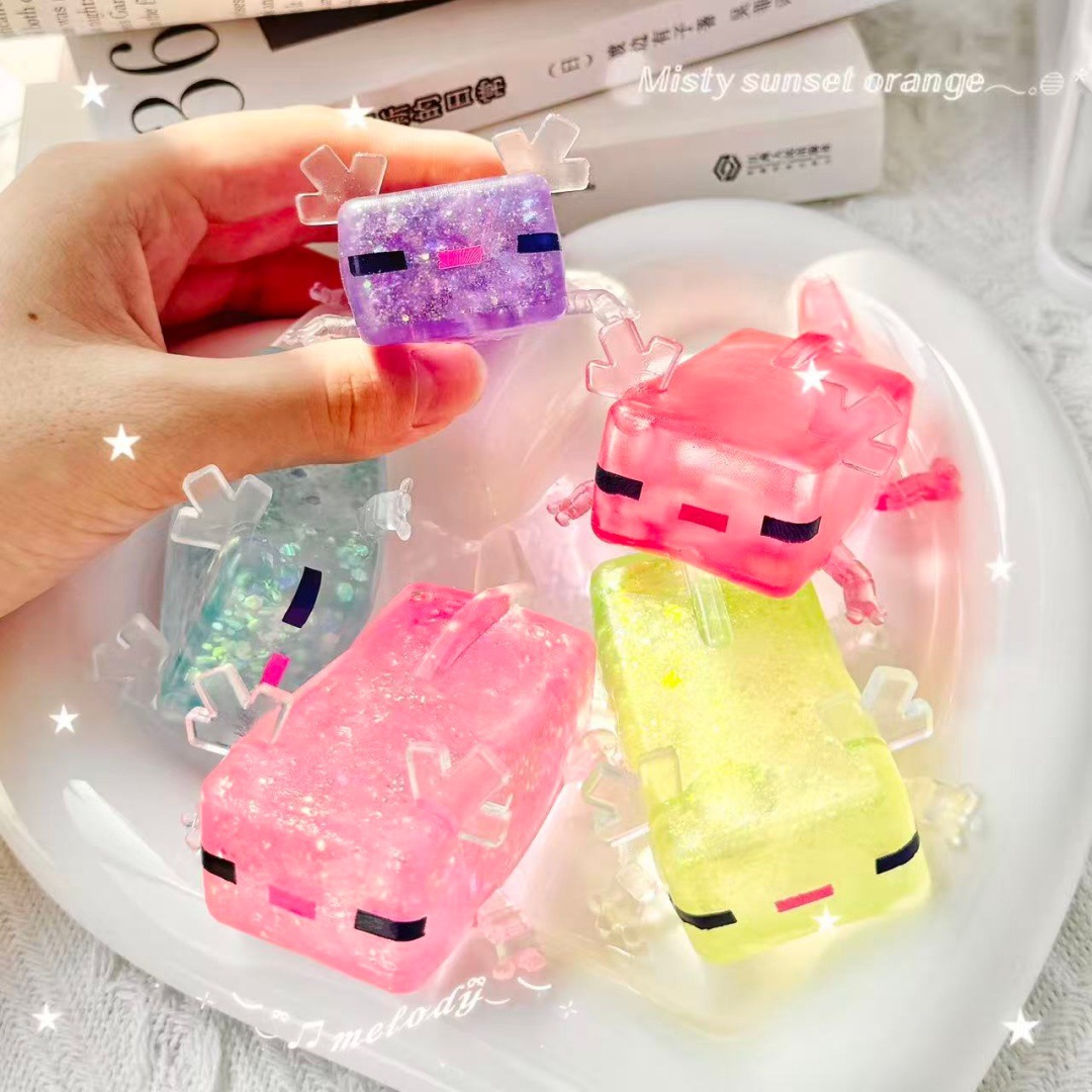 Juguete descompresivo de pato con sonido y cambio de ropa