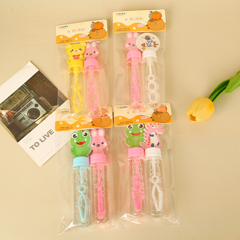 Barras de burbuja de dibujos animados de sonido pequeño juguete de burbuja de mano para niños y niñas regalos de vacaciones al por mayor