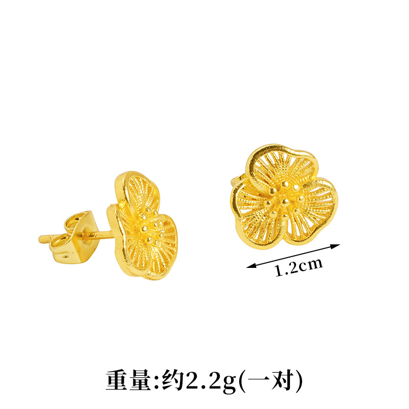 Sand Gold Sansheng flores huecos pernos de orejas de cobre chapado en oro delicados orejas de flores joyas de lujo ligero accesorios de Yiwu no se desvanecen
