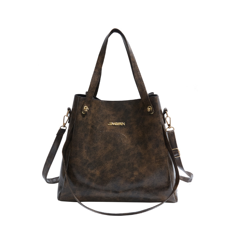 Mochila de moda de cuero suave de gran capacidad 2025, primavera nueva bolsa de hombro de viaje, bolso de mano de cuero retrógrado para mujeres