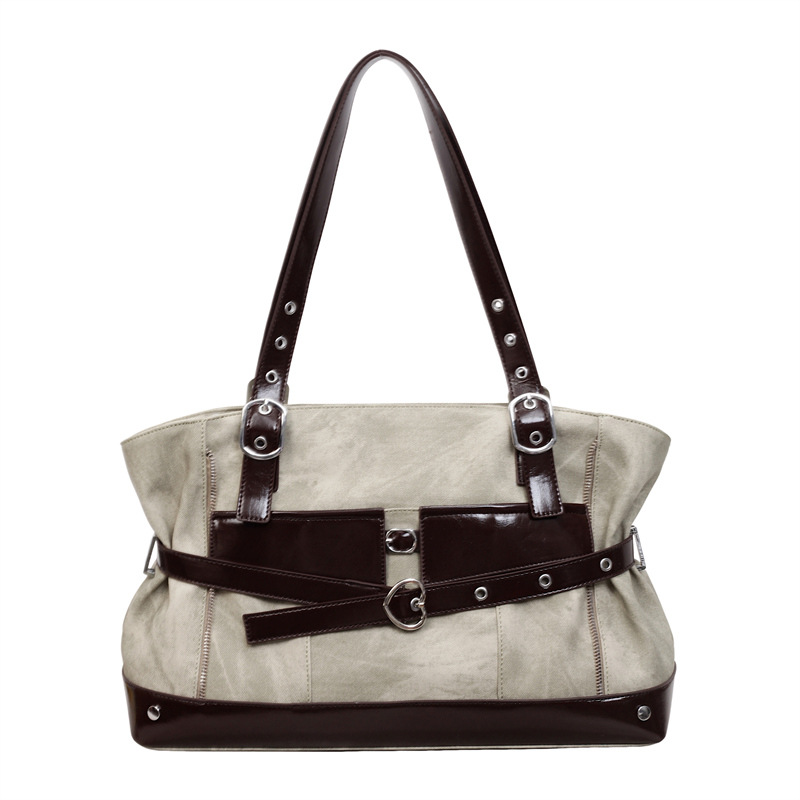 Bolsa de motocicleta de chicas calientes retro para mujeres 2026 verano nuevo nicho de lujo ligero bolso de hombro de brazo bolso de viaje transfronterizo