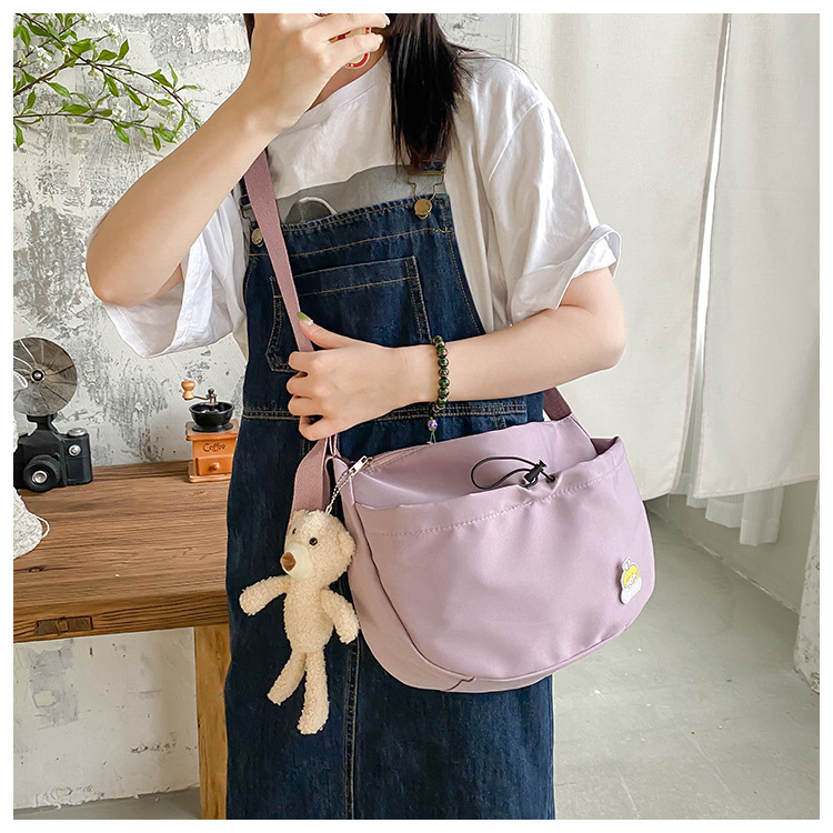 The new 2022 Little Bear canvas small bag for women is simple and versatile. The student dumpling bag is a trendy casual single-shoulder crossbody bag undefined