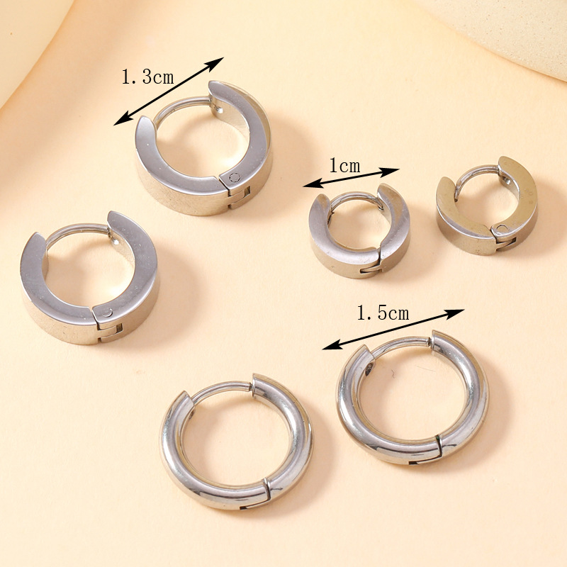 Fábrica directa pendientes de acero inoxidable personalidad de moda masculina y femenina creativa pernos redondos simple joyería pernos de oreja universal