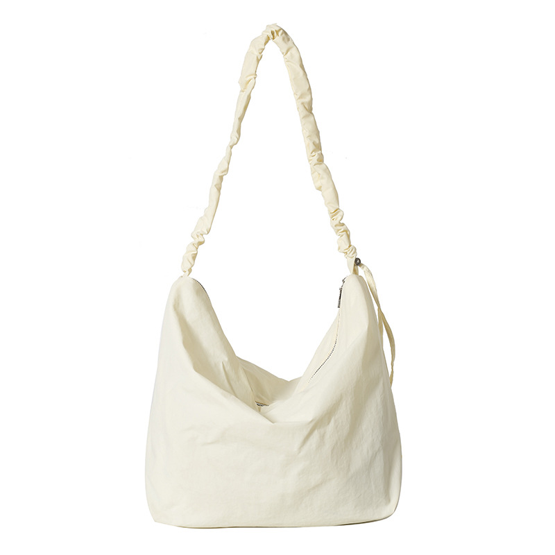Versión coreana del bolso de mensajero de estilo perezoso para mujer 2024 nuevo bolso de bola de masa deportiva de ocio de moda bolso de hombro de tela de nailon de gran capacidad
