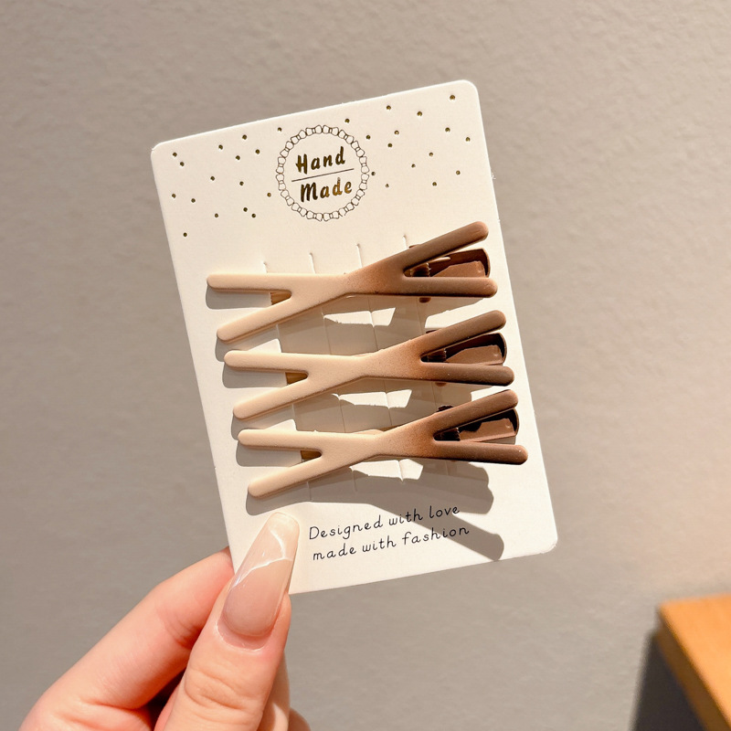 Coreana lateral frange clip de cabello de la frente de mujer sensación avanzada 2025 nuevo toque de dopamina clip de boca de pato