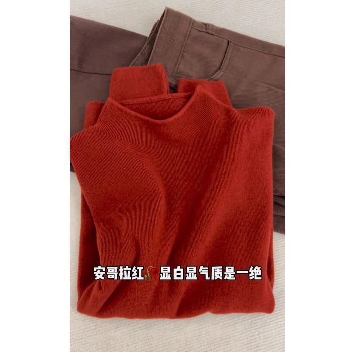 高級感の小さい立襟のセーターは底の女性の冬の修身の長袖の冬の半高襟のニットの秋冬の新型の上着を打ちます。