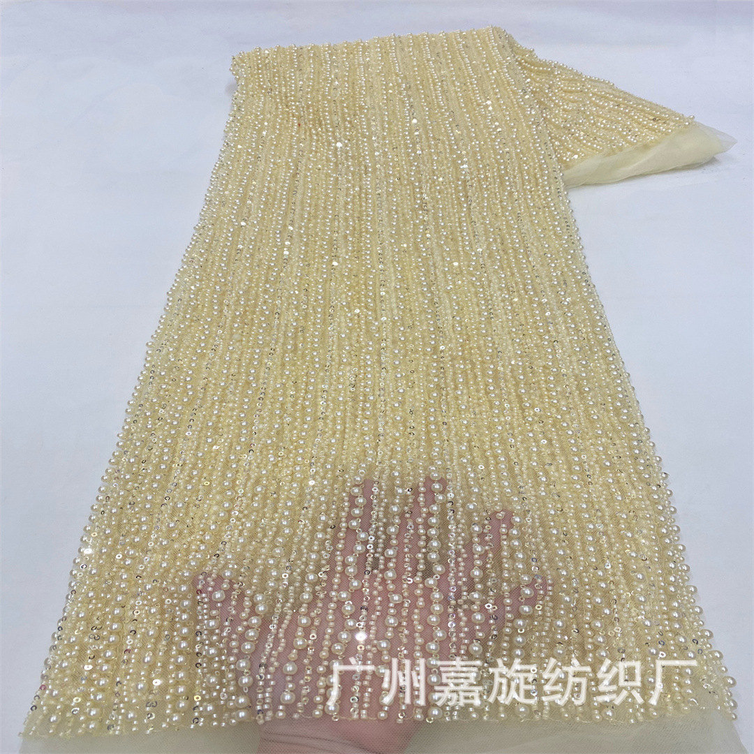 Tela de encaje de moda con bordado floral de cuentas y rayas verticales estilo francés, con abundantes cuentas, elegante para vestido de novia o de noche.