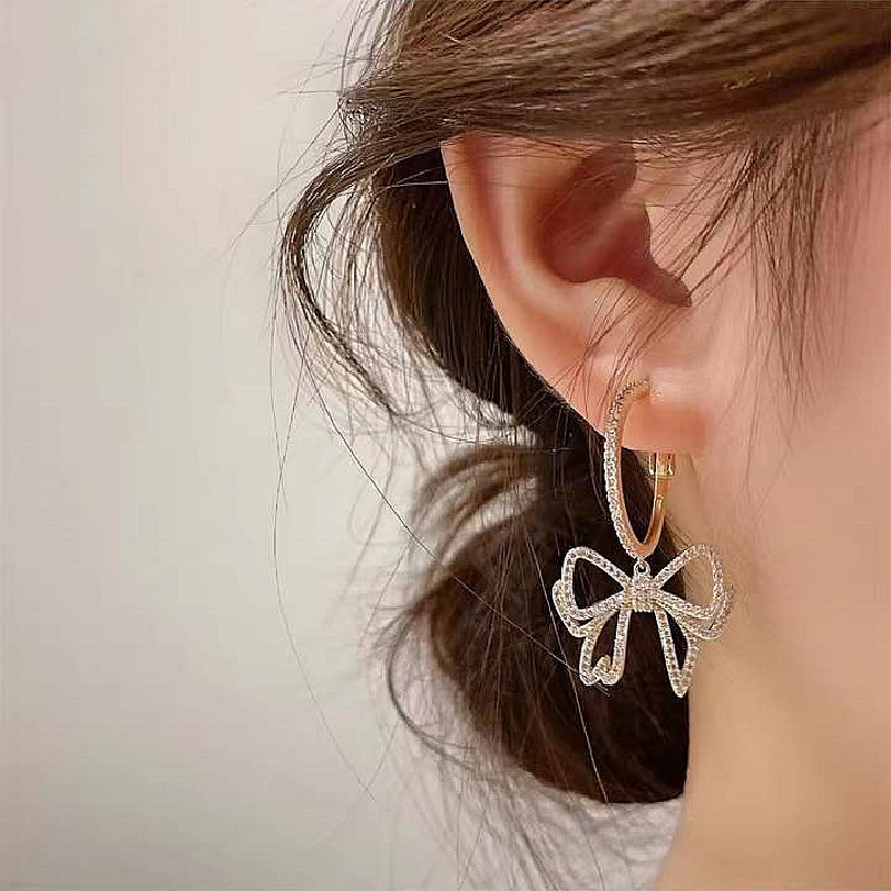 Fashion big bow tassel new alloy earrings female