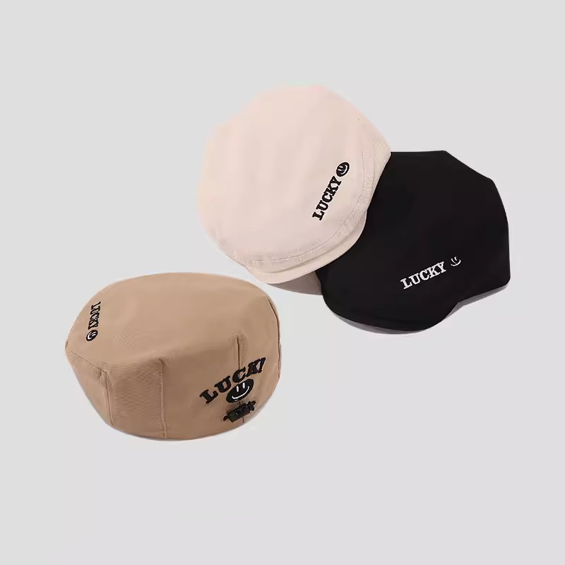 Sombreros de bebé primavera y otoño Boinas para niños, gorras de piel de melón bordadas, sombreros sonrientes, sombreros de tendencia versátiles