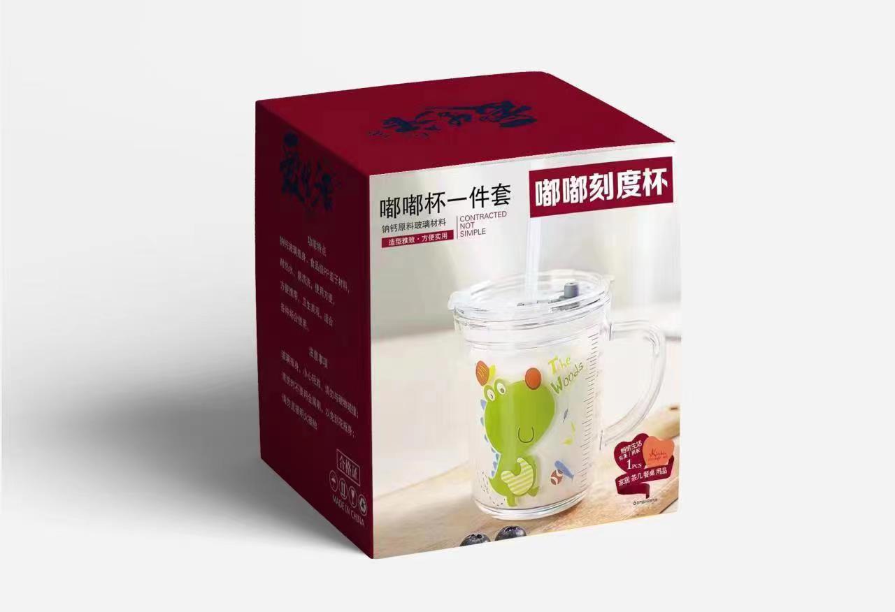 Caja completa al por mayor Doodle taza con escala de dibujos animados vidrio paja taza niños a prueba de fugas taza de regalo promocional taza