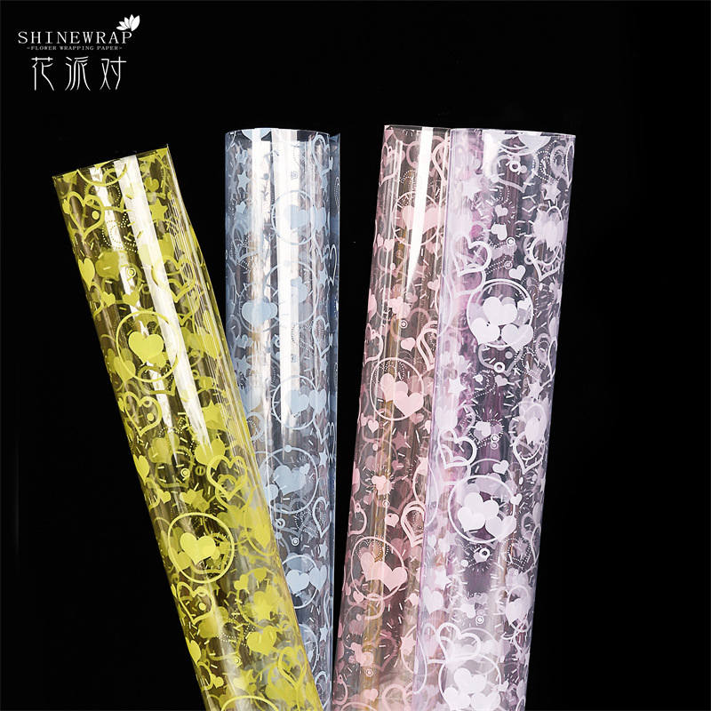 Fábrica de fiestas de flores al por mayor nuevo festival Qixi amor flor de papel de envoltura de flores transparente flores de papel de envoltura de flores regalos floristas