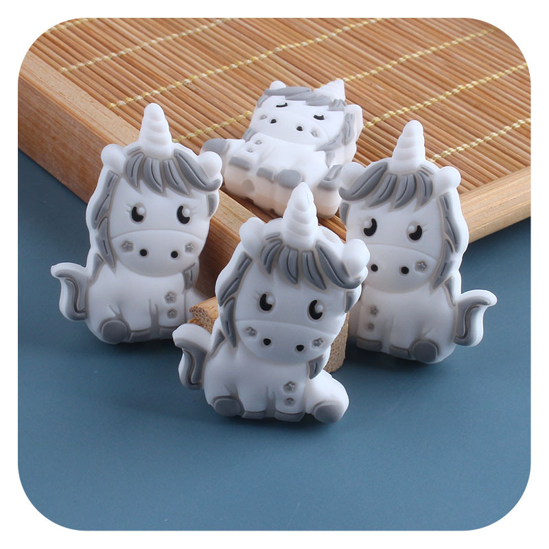 Nuevo bebé suministros unicornio de dibujos animados cuentas silicona creativo DIY chupete cadena pulsera juguete mordedor Accesorios