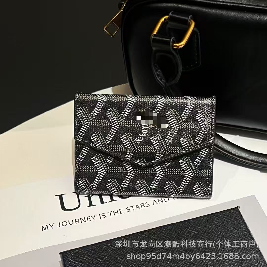 Dog tooth accordion bag black