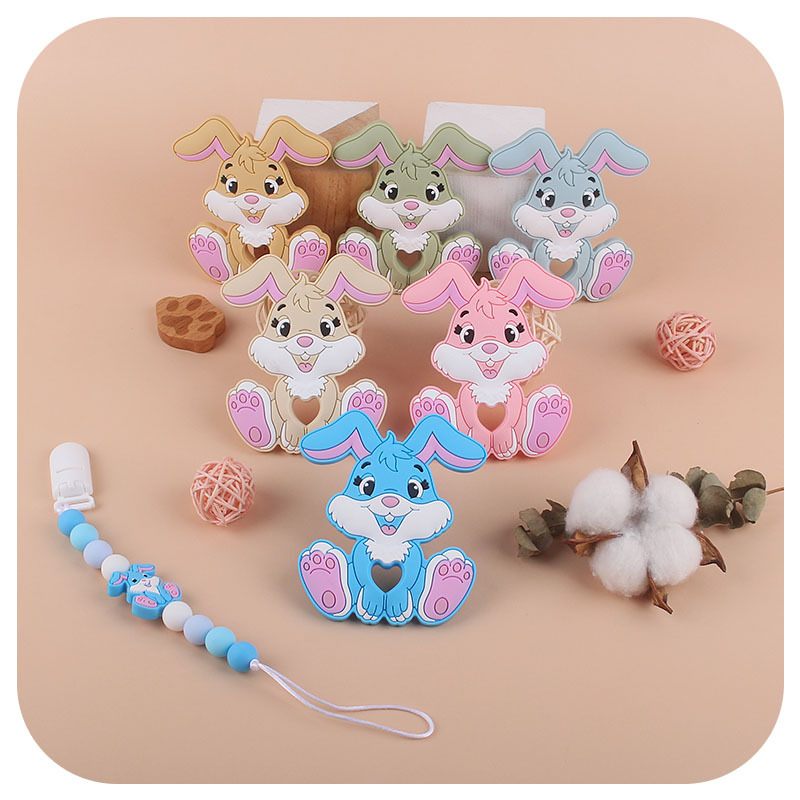 AliExpress nuevo bebé suministros dibujos animados animal silicona conejo teether bebé creativo juguete teether palo