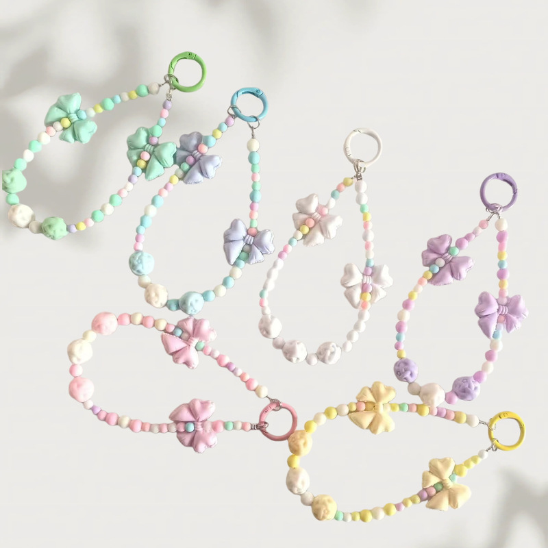 New Colorful Candy-Colored Phone Chains, Bowknot Beaded Bag Chains, Water Bottle Chains, Car Keychain Pendants Wholesale New Colorful Candy-Colored Phone Chains, Bowknot Beaded Bag Chains, Water Bottle Chains, Car Keychain Pendants Wholesale