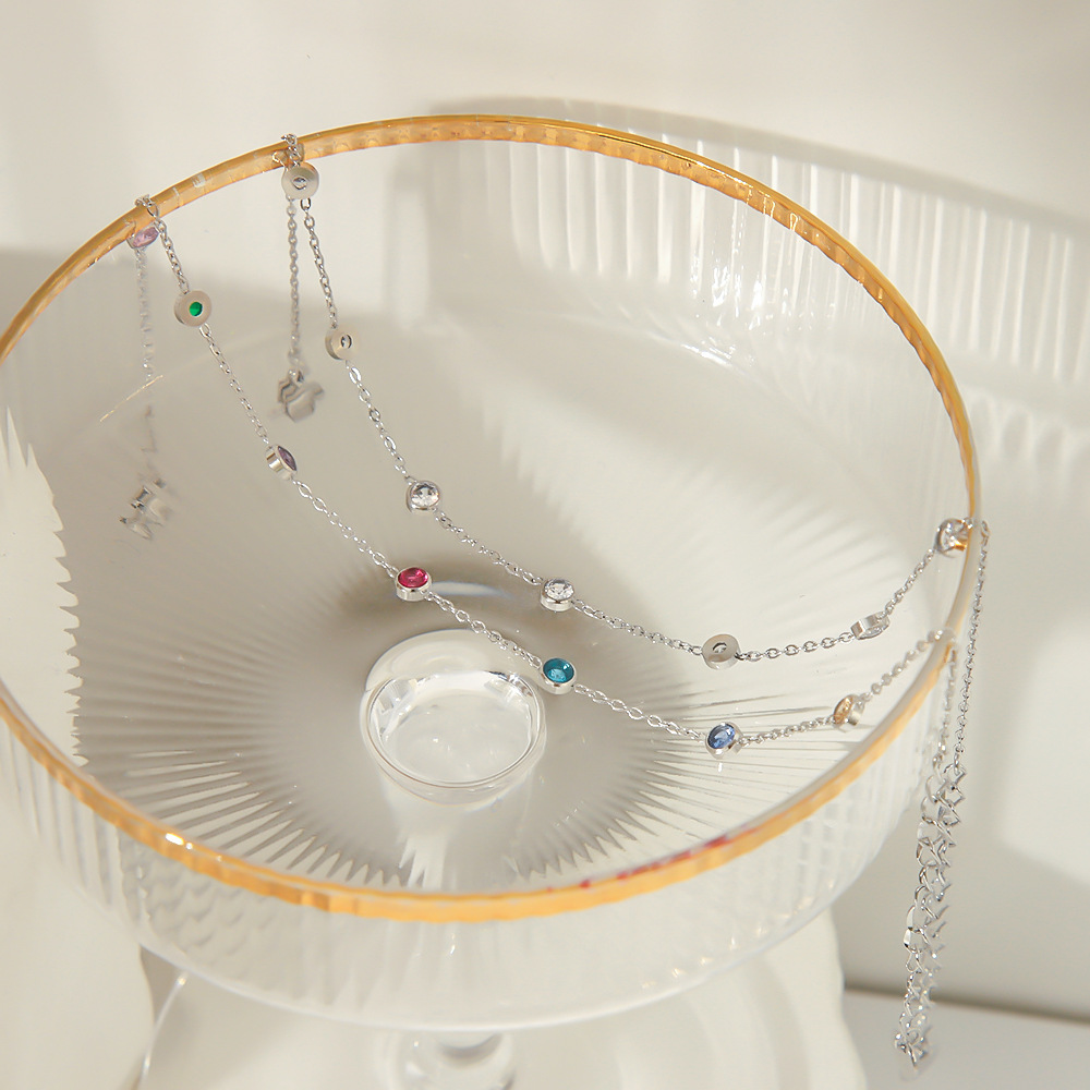 French ins venta caliente titanio acero redondo color circón tobillera femenina 18k personalidad de acero inoxidable adorno de pie joyería de dopamina