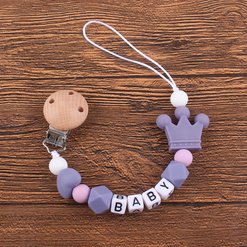 Nuevo bebé haya chupete clip calmante bebé corazón corona de silicona mordedura molar Cadena de chupete cadena anti-caída