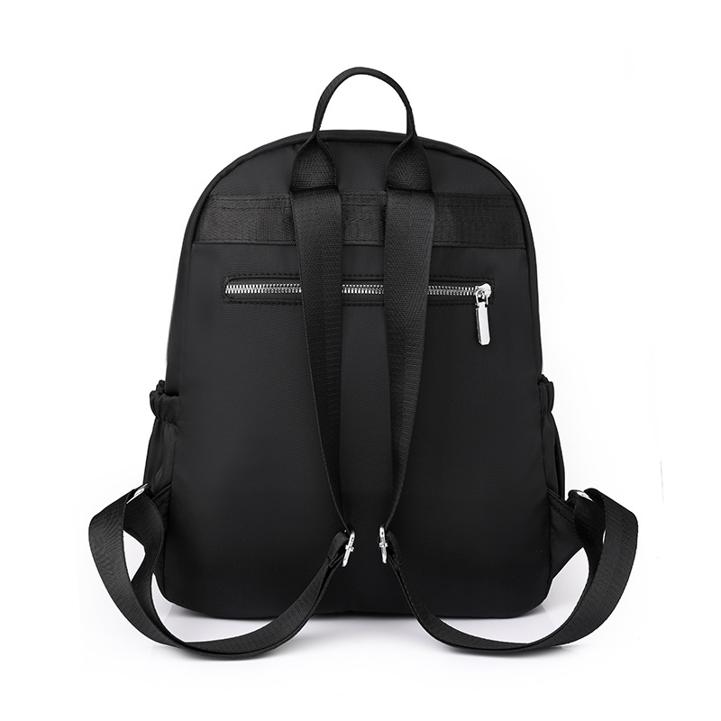 2023 nueva mochila de tela Oxford para mujer casual, color sólido simple, gran capacidad, mochila plegable ligera, mochila escolar de moda