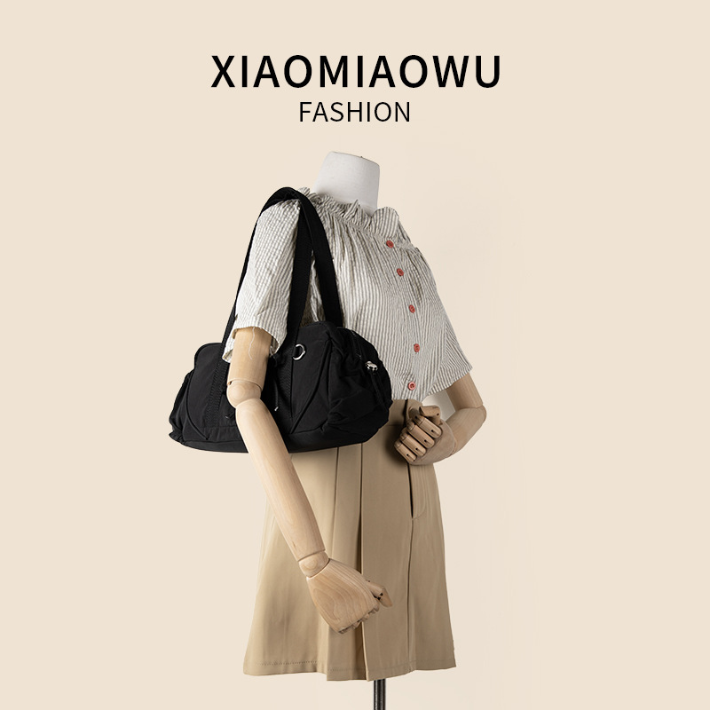 Student shoulder large capacity, women's simple bow nylon handbag, new niche style, armpit bag, high-end feel_voghion.com