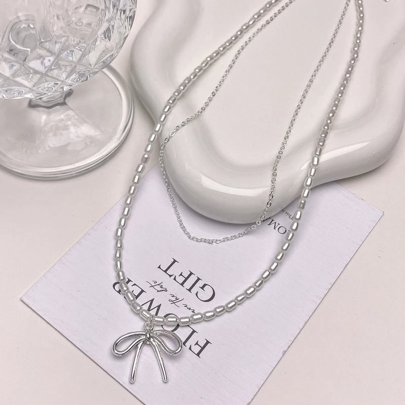 Серьга/П pendant from pearl with bow?