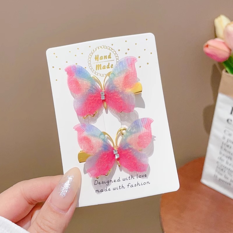 Clip de cabello de mariposa móvil ultra inmortal electrónica azul tulle perla clip de boca de pato decoración accesorios de playa clip tocado