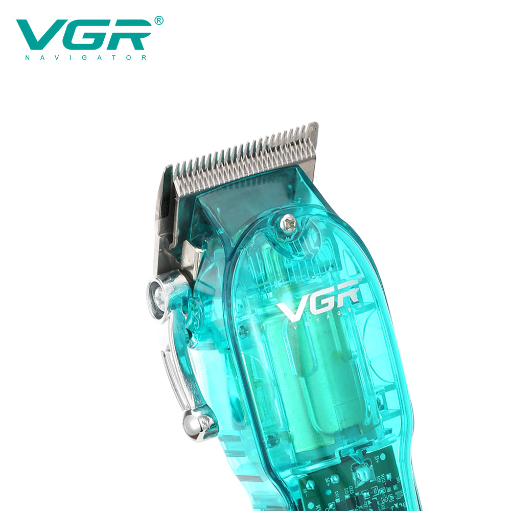 Tagliacapelli elettrico ricaricabile con display digitale trasparente e regolazione graduale, ideale per acconciature da uomo professionali._voghion.com