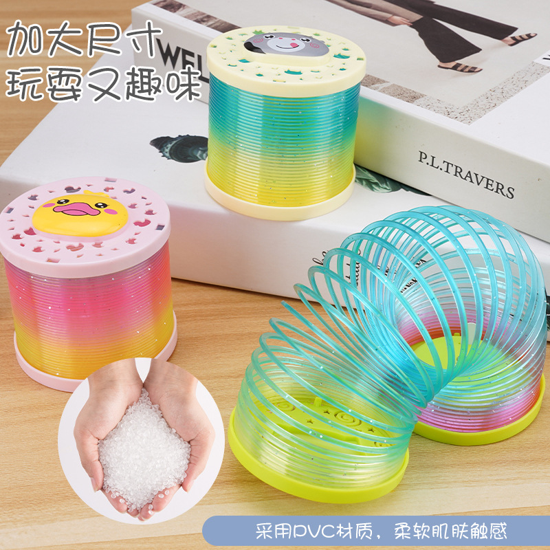 Tiktok misma proyección de dibujos animados Arco Iris anillo puesto juguetes luminosos al por mayor niños primavera anillo flash Jenga