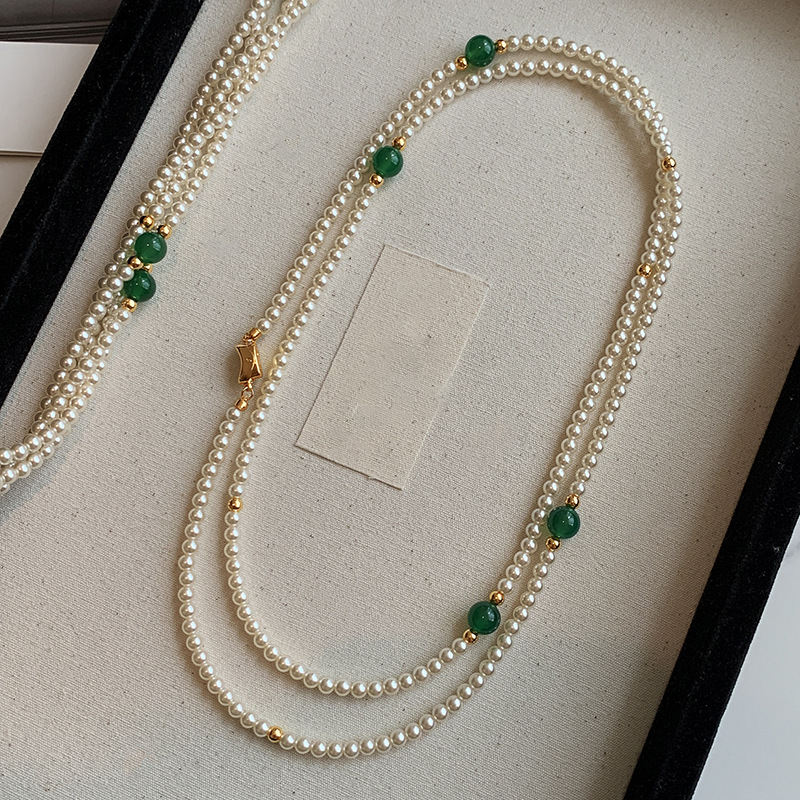 Collar de perlas artificiales transfronterizas europeas y americanas, moda femenina, temperamento de lujo ligero, cadena de suéter, sentido de alta gama, joyería de todo fósforo de nicho