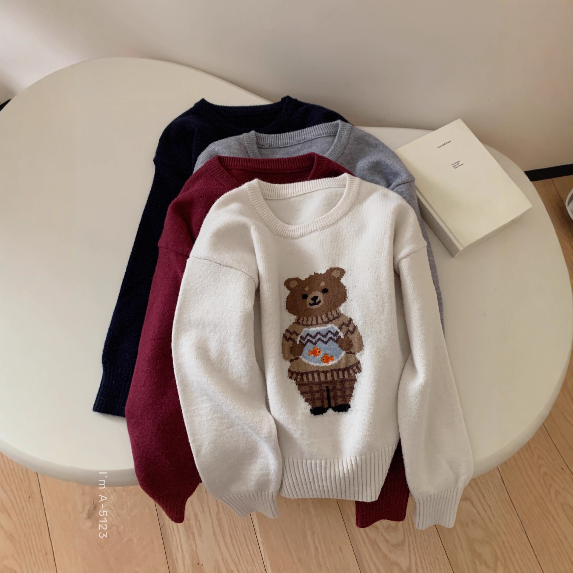 卡通小熊刺绣针织衫女2025秋冬长袖圆领学院减龄百搭打底毛衣上衣