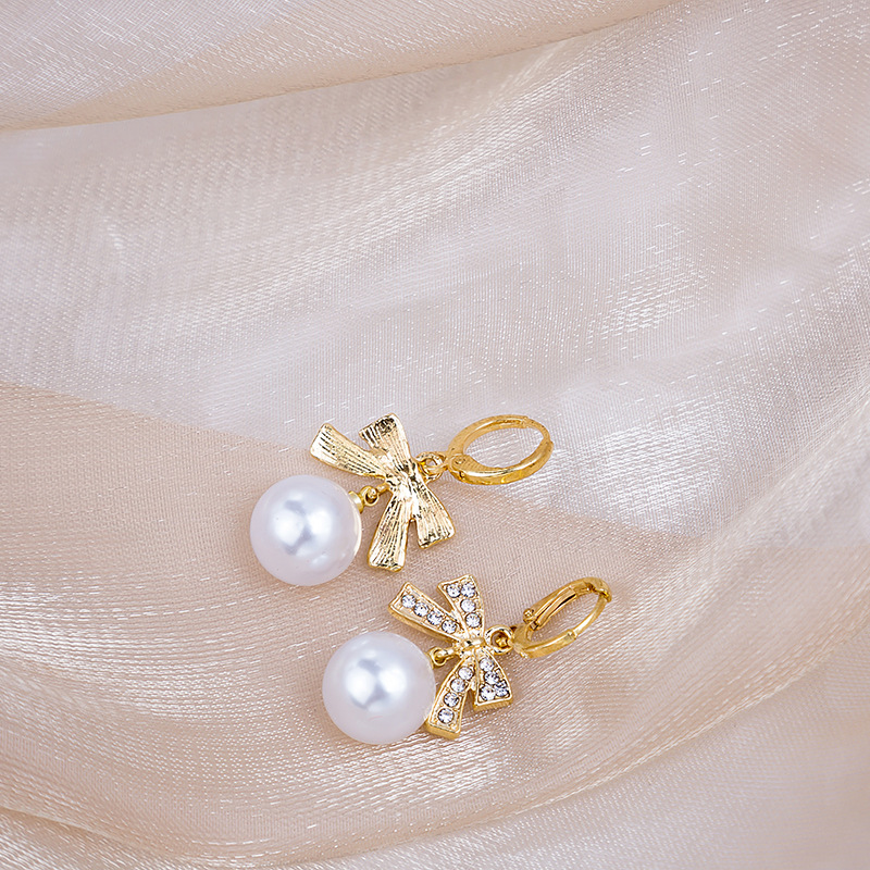 Fashion Diamond Bow Pearl Simple Alloy Drop Earrings display picture 4