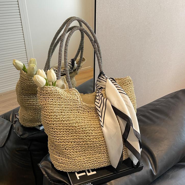 Bolsos de paja populares de verano para mujer 2025 nuevo bolso de tote hueco tejido más vendido bolso de mujer de viaje de gran capacidad