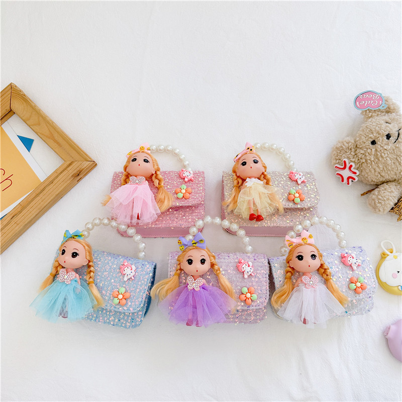 Nuevos niños estilo Chanel estilo bolsa moda perla bolso de hombro de dibujos animados muñeca bolsa de mensajero cadena