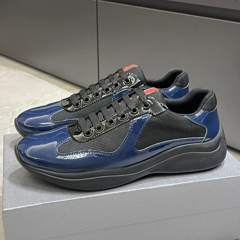 High-end, fashionable, and comfortable leather sneakers with a mesh upper and patent leather accents, designed for both men and women, comparable to athletic and casual footwear High-end, fashionable, and comfortable leather sneakers with a mesh upper and patent leather accents, designed for both men and women, comparable to athletic and casual footwear