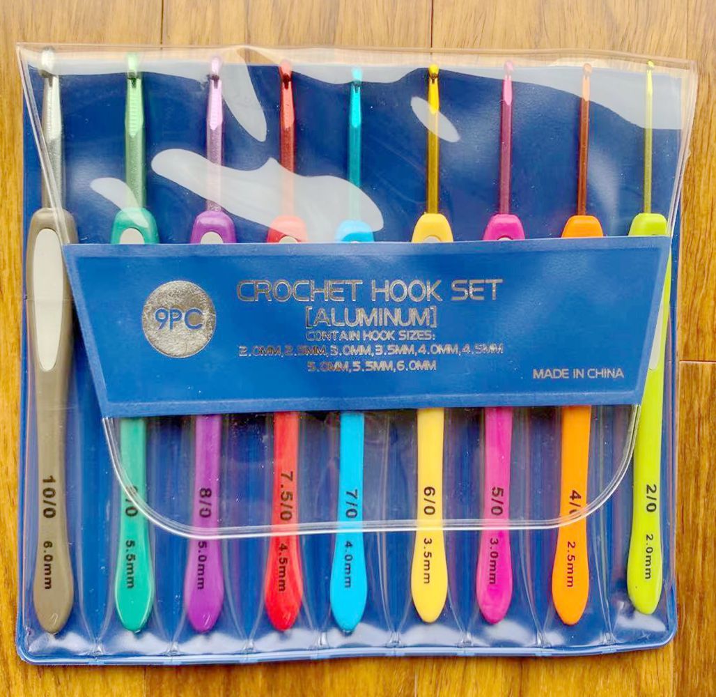 Herramientas de tejido aguja de suéter mango de plástico de color pegado aguja de acero conjunto completo 17 bolsas antideslizantes