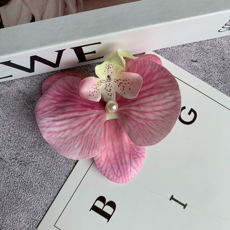 絹布の胡蝶蘭の花の頭は花の壁の部品の花の材料の頭をシミュレーションして髪を飾ってdiyの手作りの結婚祝いの贈り物を挟んで造花を飾ります。|undefined