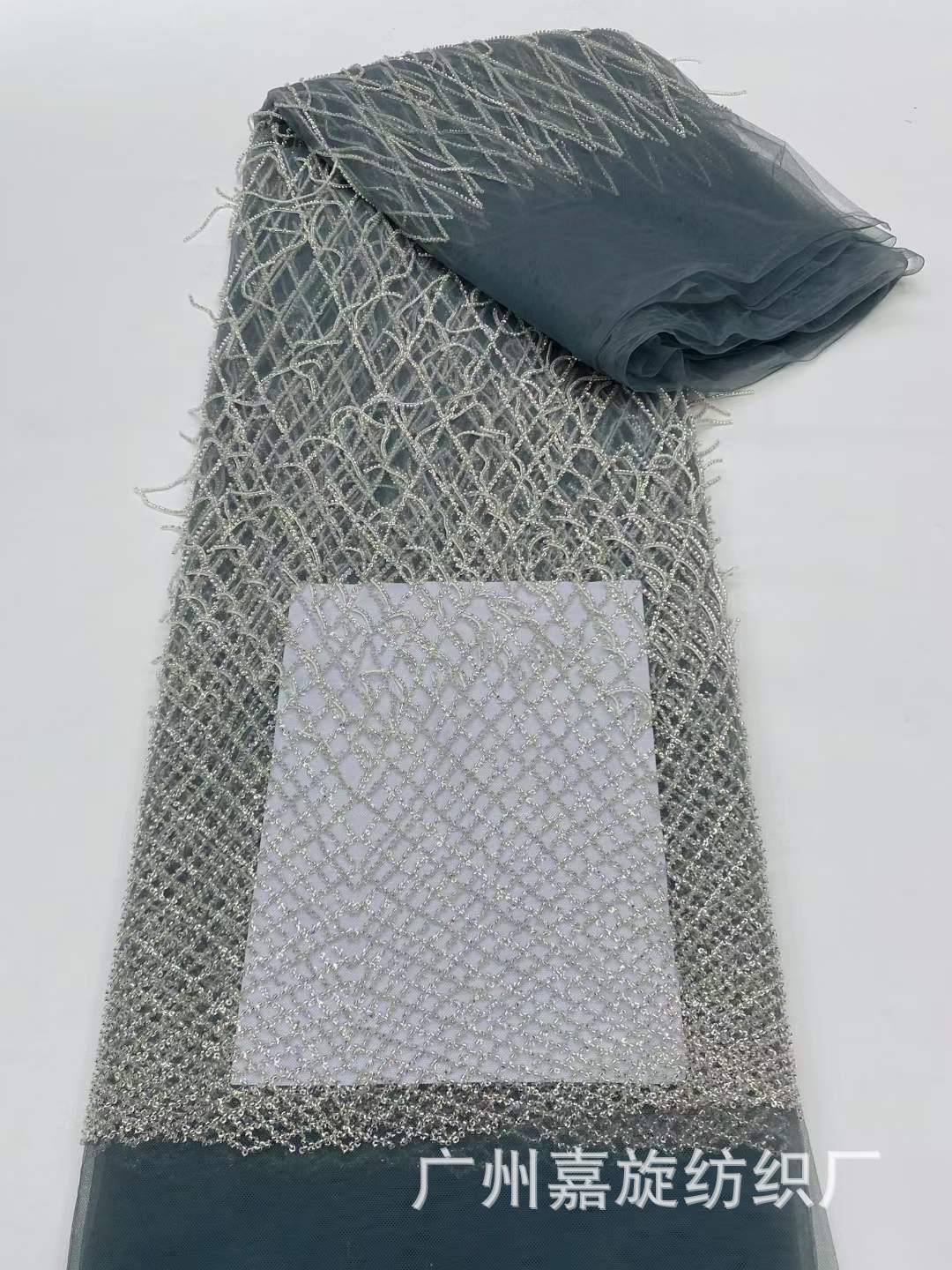 Europa y América Rhombus Plaid borla tela de encaje lentejuelas cuentas vestido de novia vestido de noche rendimiento ropa tela JX3962
