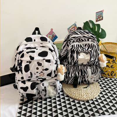 Junior school student schoolbag Korean Edition Harajuku Dairy cow stripe knapsack lovely girl capacity student Campus Backpack