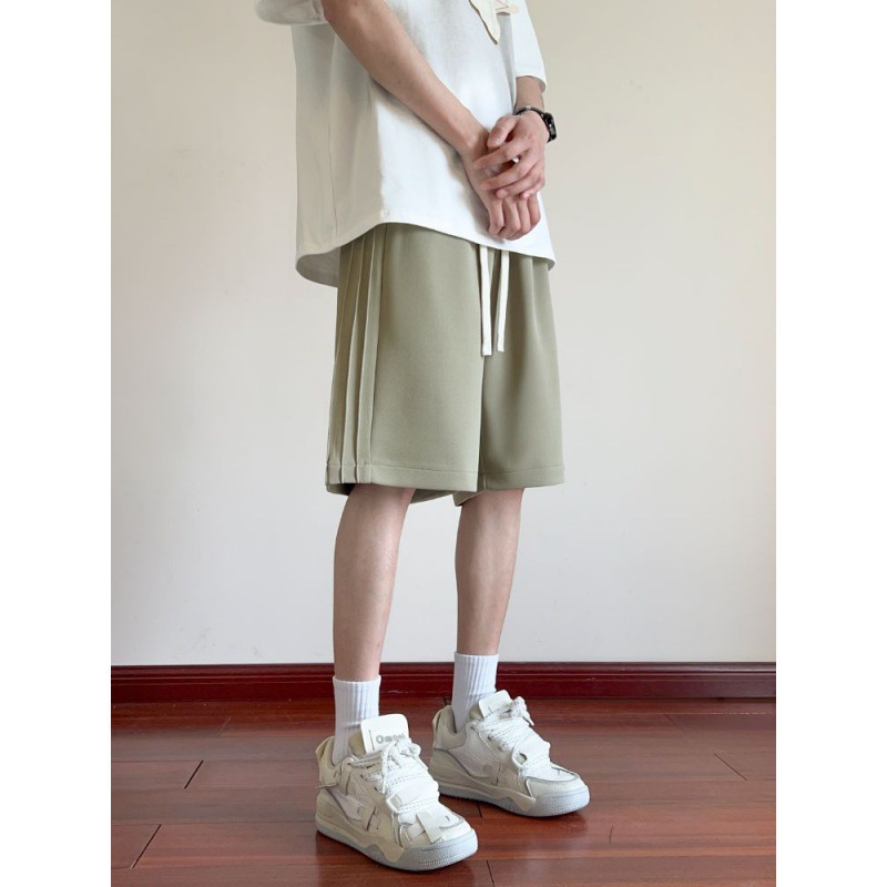 Pantalones cortos para hombres de verano delgados 2024 nuevos pantalones casuales de cinco puntos de moda pantalones deportivos de piernas largas sueltos para hombres