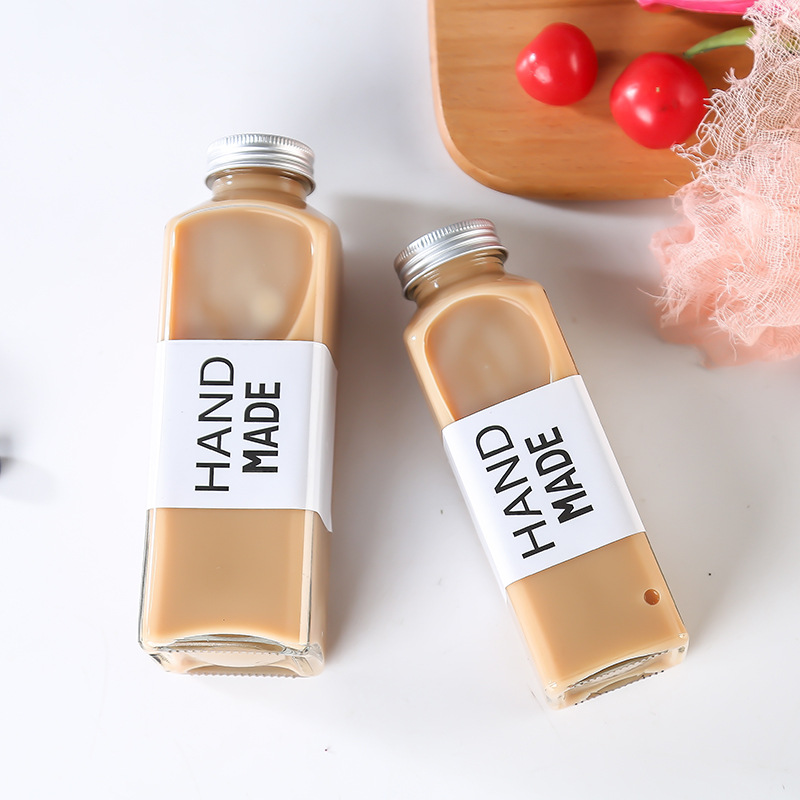 厂家直销350ML500ML玻璃奶茶泡茶咖啡果汁泡茶饮料瓶加厚带盖酒瓶